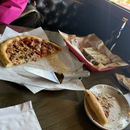 Pizza and cheese bread. Pizza and cheese bread.