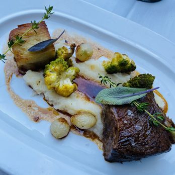 Hyeholde Restaurant - A very tender short rib with delicious potato pave, celery puree, romanesco broccoli, and pearl onions - New American Near Me - Coraopolis, Pennsylvania Hyeholde Restaurant - A very tender short rib with delicious potato pave, celery puree, romanesco broccoli, and pearl onions - New American Near Me - Coraopolis, Pennsylvania
