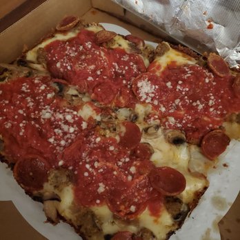 Futuro - Lunch size Detroit classic in its carryout box in the horrible lighting of my living room - Pizza Near Me - Indianapolis, Indiana Futuro - Lunch size Detroit classic in its carryout box in the horrible lighting of my living room - Pizza Near Me - Indianapolis, Indiana