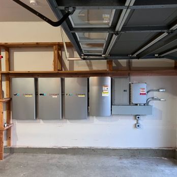 King Electric and Solar - A clean battery backup system with Enphase batteries will keep this home running even when the powers out - Electricians Near Me King Electric and Solar - A clean battery backup system with Enphase batteries will keep this home running even when the powers out - Electricians Near Me
