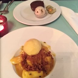 Chocolate lava cake and mangos and passion fruit sorbet topped with speculoos crumble. Delicious!