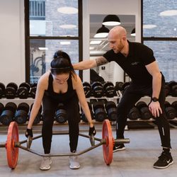 Zach Moore Personal Training - Hex bar squats are a great way to learn how to deadlift and squat. I'm cueing Amy to keep her back straight here. She's nailing it!