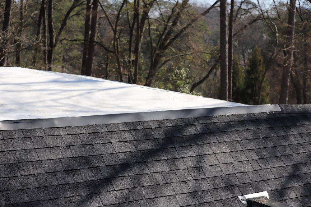 Slide of Bell Roofing