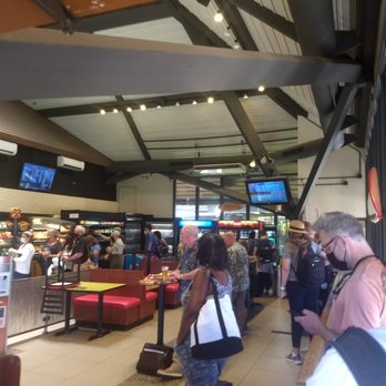 Laniakea Cafe - line stretches from outside to around the inside perimeter of the restaurant. Only 3 single stand up dining positions indoors - Bars Near Me - Kailua-Kona, Hawaii Laniakea Cafe - line stretches from outside to around the inside perimeter of the restaurant. Only 3 single stand up dining positions indoors - Bars Near Me - Kailua-Kona, Hawaii