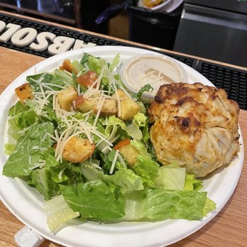 Koco's Pub - Crab cake with Caesar salad - Pubs Near Me - Baltimore, Maryland Koco's Pub - Crab cake with Caesar salad - Pubs Near Me - Baltimore, Maryland