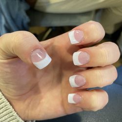 Affinity Day Spa & Salon - First manicure I received, I asked for a THIN white tip French manicure and got this..