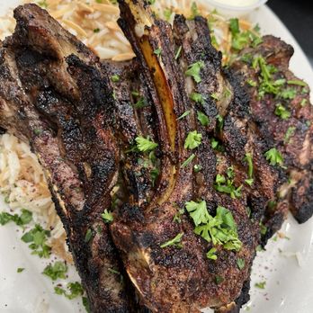 Amira's Kitchen - Lamps chops (3pc.) served with basmati rice or frinch fries and Arabian salata - Middle Eastern Near Me - Cheektowaga , New York Amira's Kitchen - Lamps chops (3pc.) served with basmati rice or frinch fries and Arabian salata - Middle Eastern Near Me - Cheektowaga , New York
