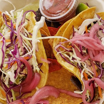 Holoholo Grill - Enjoyed my fish taco. Fish was freshly cooked, juicy moist. Good tasting tacos. I didn't enjoy the corn tortillas, it seemed uncooked. - Hawaiian Near Me - Koloa, Hawaii