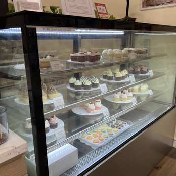 Sugar n Flakes Bakery & Cafe - Cupcake display case - Bakeries Near Me - Bellevue, Washington Sugar n Flakes Bakery & Cafe - Cupcake display case - Bakeries Near Me - Bellevue, Washington