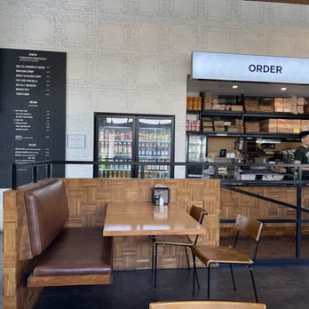 Banh Mi Station - Interior looking toward menu board and open kitchen order counter. - Vietnamese Near Me - Dallas, Texas Banh Mi Station - Interior looking toward menu board and open kitchen order counter. - Vietnamese Near Me - Dallas, Texas