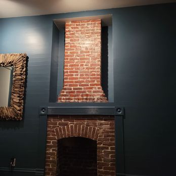 Grand Maloney Hotel - Fireplace in the blue room. - Hotels Near Me - Key West, Florida Grand Maloney Hotel - Fireplace in the blue room. - Hotels Near Me - Key West, Florida