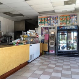 the front counter of a donut shop