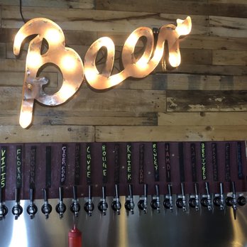 Tipsy Cactus TapRoom & Bottle Shop - Awesome display of their beers on tap! - Wine Bars Near Me - Mesa, Arizona
