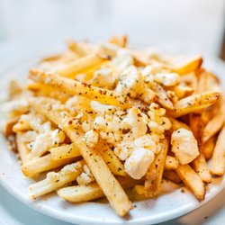 Petra Greek - Petra Fries: French fries with Feta cheese, oregano and olive oil.