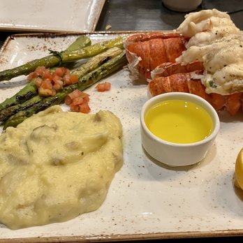 J Gilbert's - Ok let's share lobster tails, garlic mash and grilled asparagus - Bars Near Me - Omaha, Nebraska