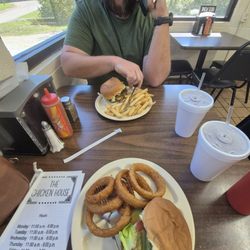 Chicken House - Our burgers with onion rings and fries.