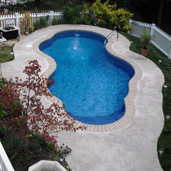 Admiral Pools - Free form vinyl liner with brick coping and stamped concrete decking - Pool & Hot Tub Service Near Me - Abingdon, Maryland