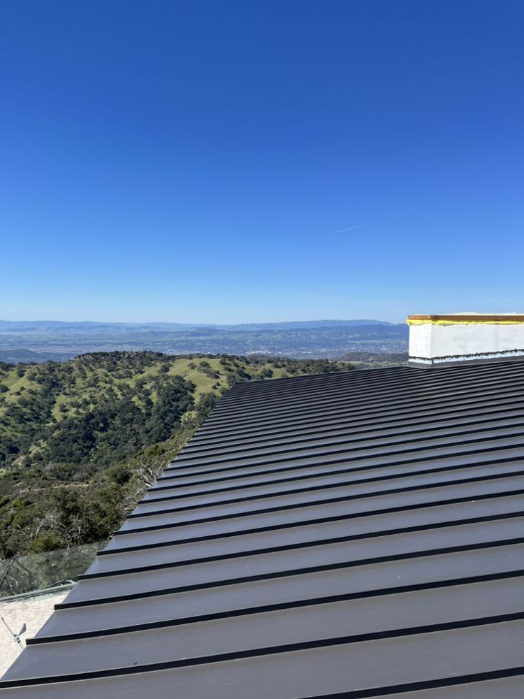 Slide of T&K Roofing