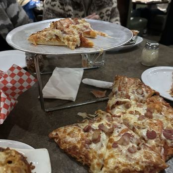 Santa Lucia Pizza - We put the stand back on the table and set the pan back on it for the picture - Italian Near Me - Winnipeg, Manitoba Santa Lucia Pizza - We put the stand back on the table and set the pan back on it for the picture - Italian Near Me - Winnipeg, Manitoba