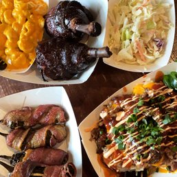 Jalapeno poppers, Smoked out spud with brisket, bacon wrapped chicken drumsticks