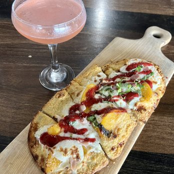 712 Eat + Drink - Peach Flatbread + Peach Cocktail - New American Near Me - Council Bluffs, Iowa 712 Eat + Drink - Peach Flatbread + Peach Cocktail - New American Near Me - Council Bluffs, Iowa