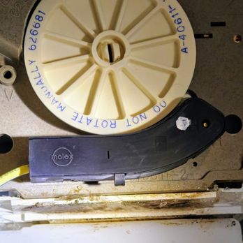 Mallard Appliance - Close up view of ice maker motor showing ice forming where water leaked and rusted motor. - Appliances & Repair Near Me Mallard Appliance - Close up view of ice maker motor showing ice forming where water leaked and rusted motor. - Appliances & Repair Near Me