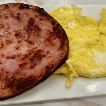 Keke's Breakfast Cafe - Side of eggs and ham steak as the other part of the waffle combo. - Breakfast & Brunch Near Me - Henderson, Nevada Keke's Breakfast Cafe - Side of eggs and ham steak as the other part of the waffle combo. - Breakfast & Brunch Near Me - Henderson, Nevada