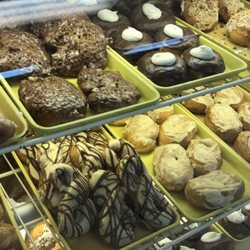 Embers Bakery and Cafe - Display case filled with a variety of pastries