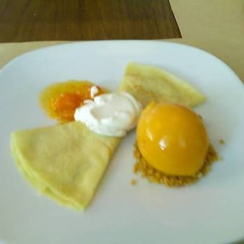 Perry St - Lunch Dessert - Crepes with Apricot Icecream, Apricot Compote and cookie crumbles - New American Near Me - New York, New York Perry St - Lunch Dessert - Crepes with Apricot Icecream, Apricot Compote and cookie crumbles - New American Near Me - New York, New York