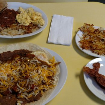 Daylight Donuts - Delicious huevos rancheros with the hash browns on the side. The corned beef hash was yummy too - Donuts Near Me - Breckenridge, Colorado