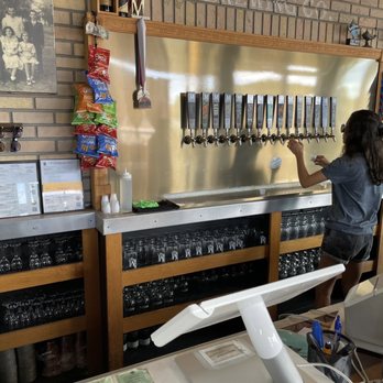 Mastry'S Brewing - a woman filling up a beer - Brewpubs Near Me - St. Pete Beach, Florida Mastry'S Brewing - a woman filling up a beer - Brewpubs Near Me - St. Pete Beach, Florida
