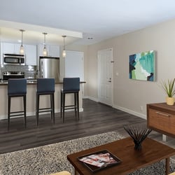 Avalon La Jolla Colony - Kitchens with Quartz Countertops, Tile Backsplash, and Stainless Steel Appliances