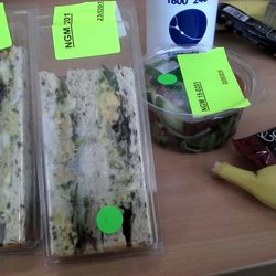 Centre for Clinical Studies - Two sandwiches.. Salad. Banana. And sweet granola bar.