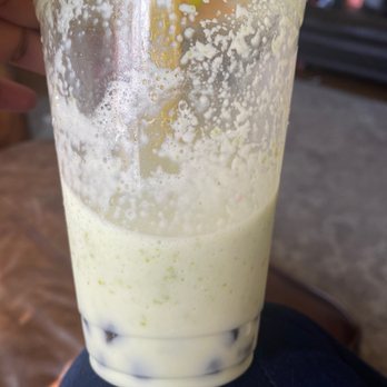 Woodys Boba Drinks - a person holding a plastic cup - Bubble Tea Near Me - Santa Maria, California Woodys Boba Drinks - a person holding a plastic cup - Bubble Tea Near Me - Santa Maria, California