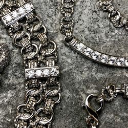 Part of Curt's heavy metal collection. Solid sterling silver with a twisted theme. Made with Cz and natural gem stones.