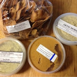 Hummus Heaven - Hummus Heaven: avocado cilantro, spicy black bean and artichoke hummus. The chips are fried pita chips- Lemon and herbs-yummy :)