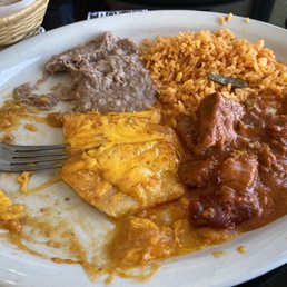 Texas Plate- 2 enchiladas, carne guisada, rice and beans. Texas Plate- 2 enchiladas, carne guisada, rice and beans.