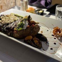 Ron Lahody Trust Your Butcher Steakhouse - Signature ribeye with asparagus and loaded potato