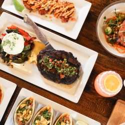 Tequila 61 - Jicama Coconut Shrimp Tacos, Gaucho Steak, Pork Chop Adobada, Salsa, Paloma Drink, and house salsa.