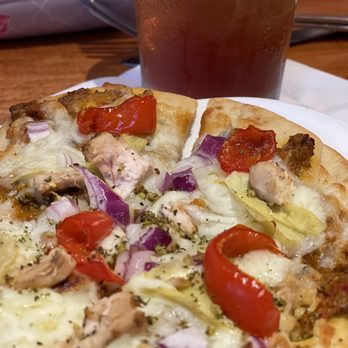 FnG Eats - Flatbread - this week they had pesto, chicken, diced red onion, tomatoes, artichoke and lots of cheese. This was the best part of our meal. - New American Near Me - Keller, Texas FnG Eats - Flatbread - this week they had pesto, chicken, diced red onion, tomatoes, artichoke and lots of cheese. This was the best part of our meal. - New American Near Me - Keller, Texas
