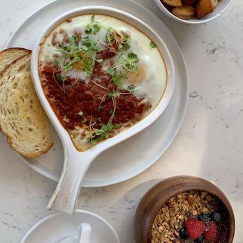 MID KITCHEN - Cappuccino, red bowl, house potatoes, and shekshooka! - Breakfast & Brunch Near Me - Evanston, Illinois