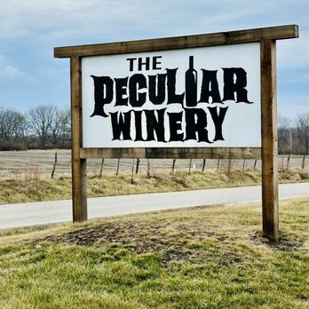 The Peculiar Winery - a sign for the winery - Wine Tasting Room Near Me - Peculiar, Missouri The Peculiar Winery - a sign for the winery - Wine Tasting Room Near Me - Peculiar, Missouri
