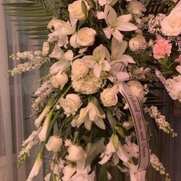Beautiful funeral floral arrangement delivered to Dinuba. Creative flowers never disappoints. Beautiful.