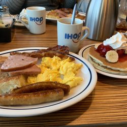 IHOP - Sampler breakfast + strawberry banana pancakes (pancakes are like banana bread with this order)