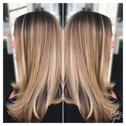 Highlights and a haircut give this beauty a new look!