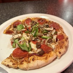 Pizza Hut - Tastes as bad as it looks.