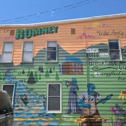 Promotional art on building next door. Only visible if you are driving from the east on US50/Main Street.