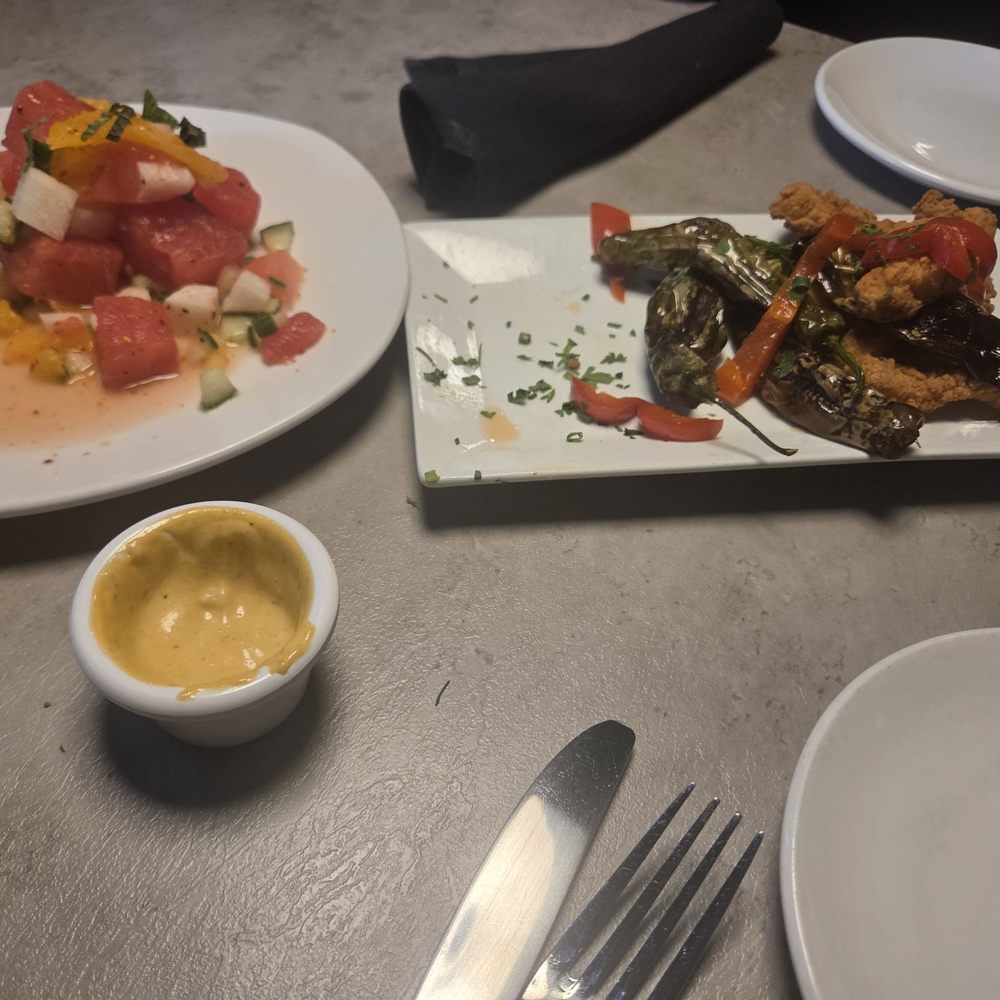 Lake Forest Bar & Grill - Watermelon salad and what is left of the calamari - American Near Me - Lake Forest Park, Washington Lake Forest Bar & Grill - Watermelon salad and what is left of the calamari - American Near Me - Lake Forest Park, Washington