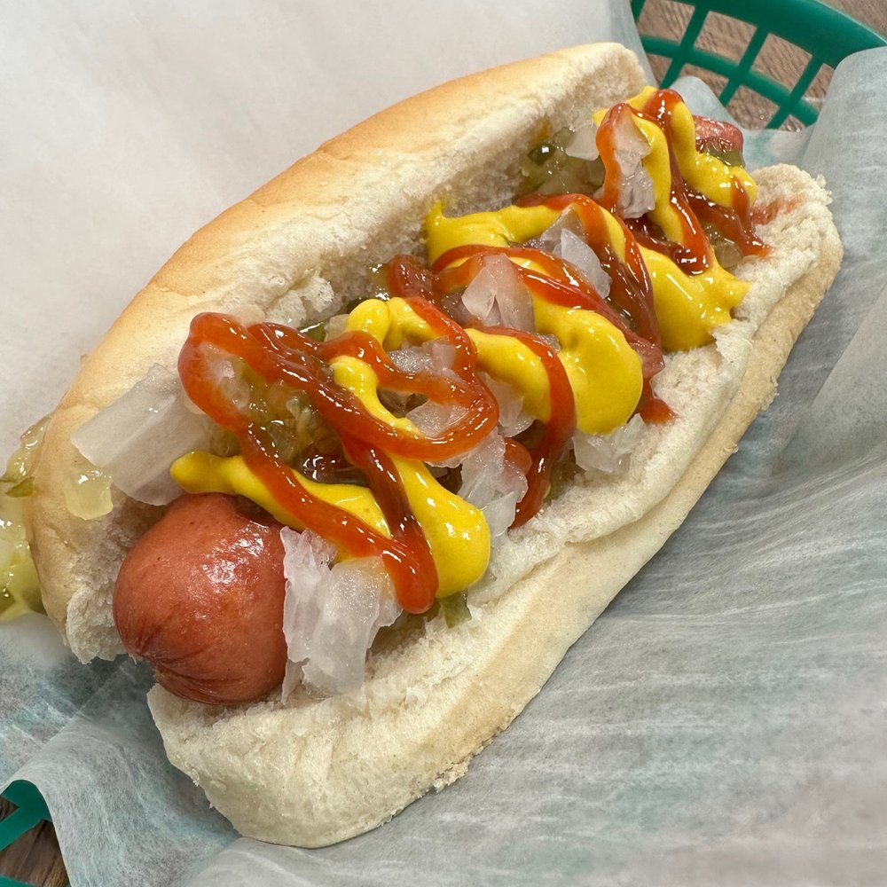 Parker’s Parlor - a hot dog with mustard and ketchup - Ice Cream & Frozen Yogurt Near Me - Grove City, Pennsylvania Parker’s Parlor - a hot dog with mustard and ketchup - Ice Cream & Frozen Yogurt Near Me - Grove City, Pennsylvania