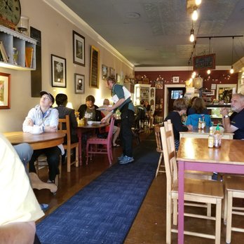 The Fat Radish - Main seating area with windows behind that look to the street. - Breakfast & Brunch Near Me - Cornucopia, Wisconsin The Fat Radish - Main seating area with windows behind that look to the street. - Breakfast & Brunch Near Me - Cornucopia, Wisconsin